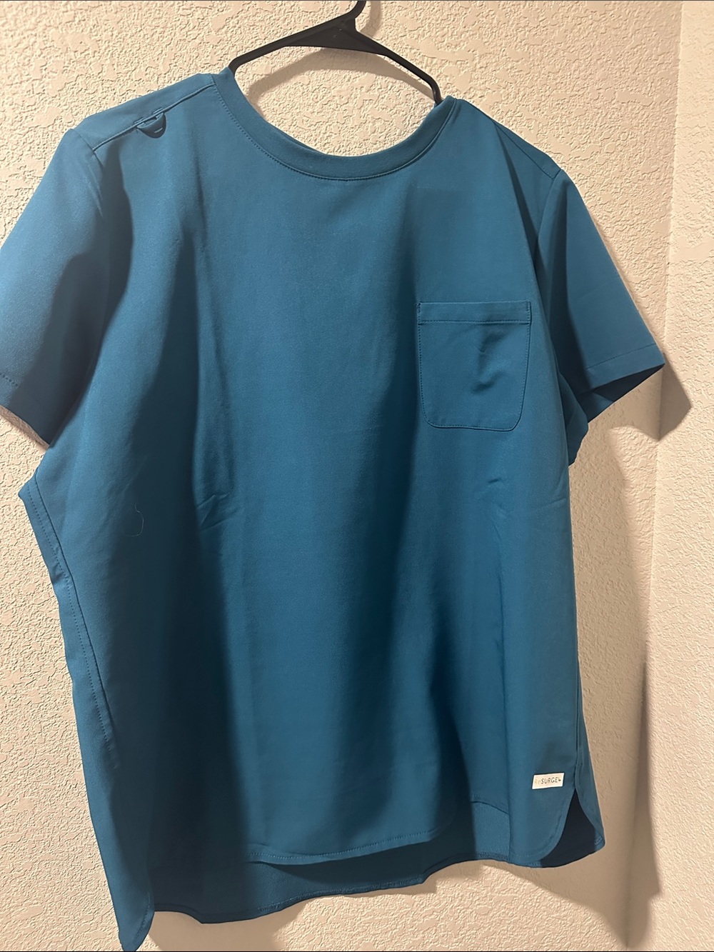 Resurge Caribbean blue scrub top